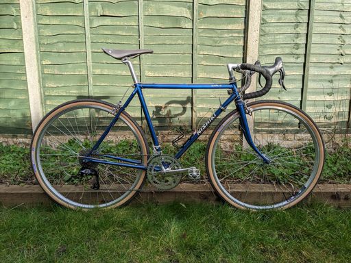 1983 Nishiki Olympic 12, upgraded with 700c wheels and wider tyres.